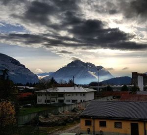 High angle view of town against cloudy sky