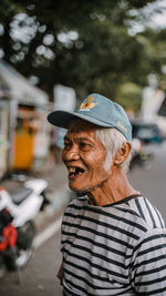 Portrait of man wearing hat outdoors