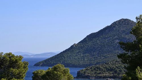 Scenic view of mountains against clear sky