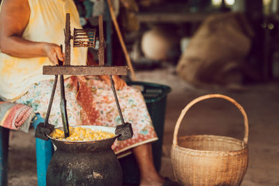 Close-up of man holding ice cream at market