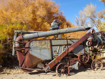 Rusted thresher machine on display in benton, ca