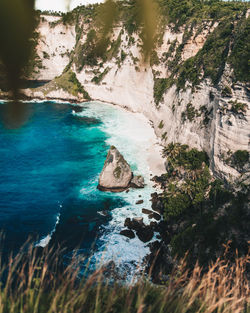 High angle view of rocks in sea