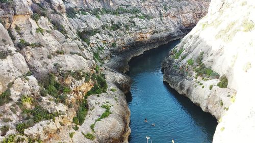 High angle view of river amidst cliff