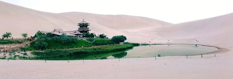 Panoramic view of temple on building against sky