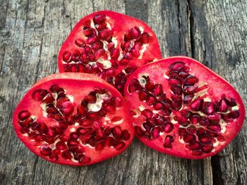 High angle view of red berries on table