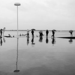 Reflection of people in water