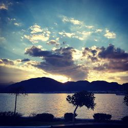 Scenic view of lake at sunset