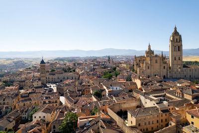 High angle view of buildings in city against sky