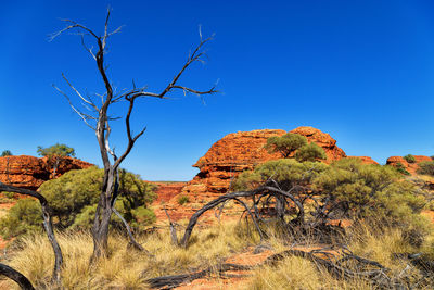 View of rock formation against clear blue sky