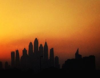 View of buildings at sunset