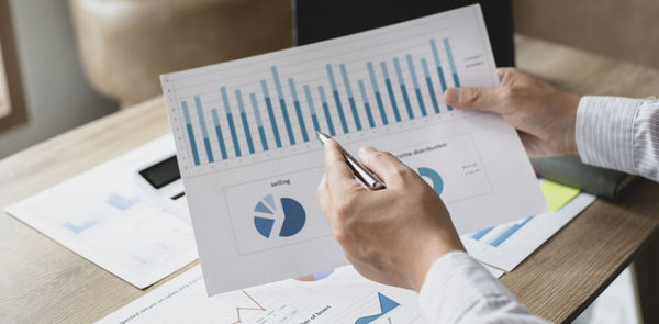 High angle view of man using laptop on table