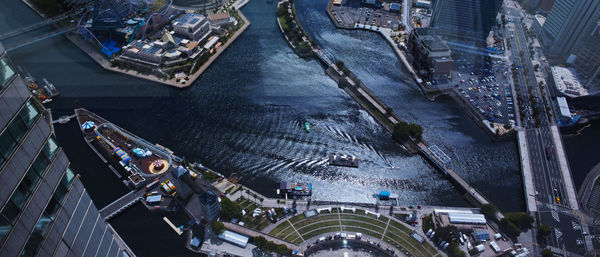 High angle view of boats in city