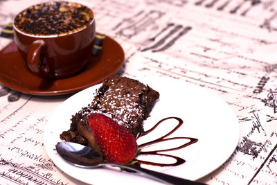 Close-up of dessert served on table