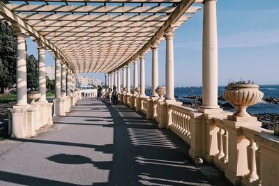 View of colonnade against sky