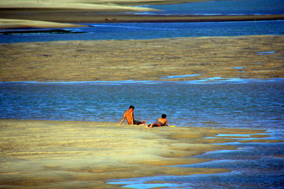 Friends enjoying at beach