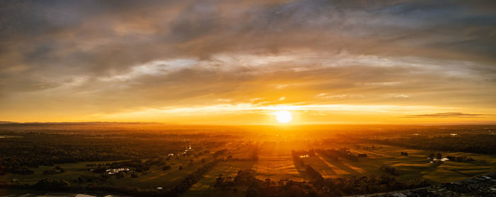 High angle view of cityscape against sky during sunset