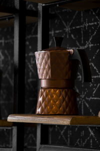 Close-up of containers on table