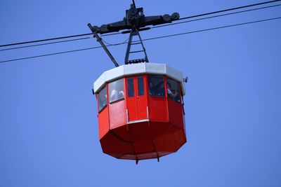 Low angle view of a gondola in barcelona  against clear sky