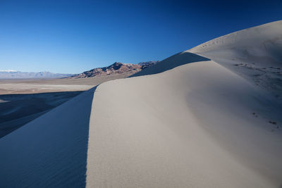 Eureka valley sand dunes against clear blue sky