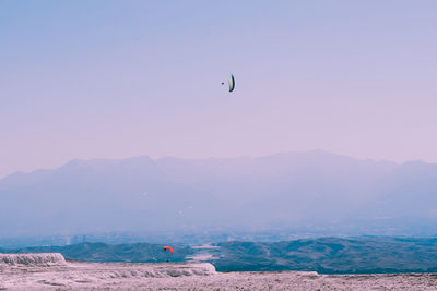 Scenic view of sea against clear sky during sunset