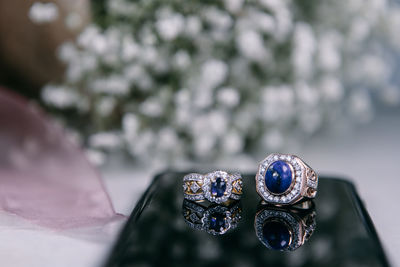 Close-up of rings over table