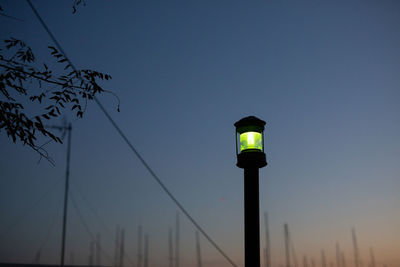 Low angle view of street light against clear sky