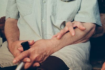 Midsection of man hands