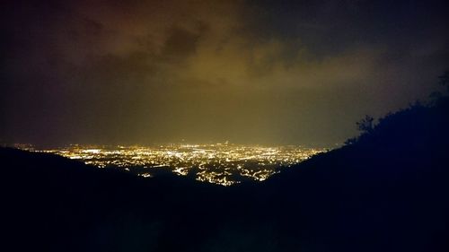 Illuminated cityscape at night