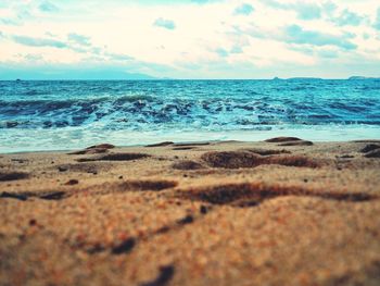 Scenic view of beach against sky