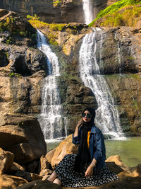 Woman and waterfall