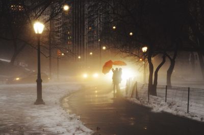 Illuminated street light at night