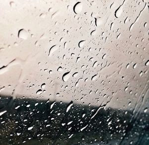 Close-up of water drops on glass