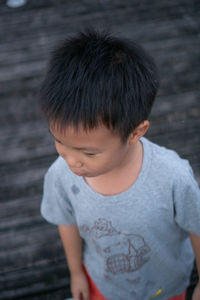 High angle view of boy looking away