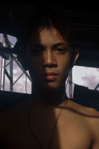 Portrait of young man looking away