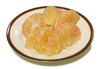 High angle view of orange fruit in plate