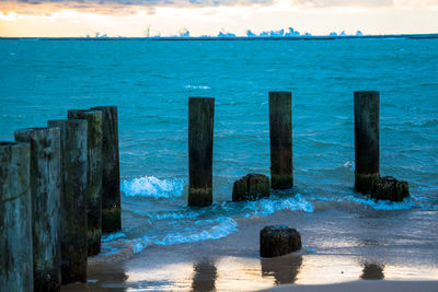 Scenic view of sea against blue sky