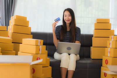 Young woman using smart phone