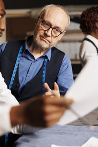 Portrait of senior man using mobile phone