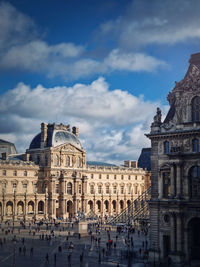 Louvre museum territory, paris, france. the famous palace site view vertical background