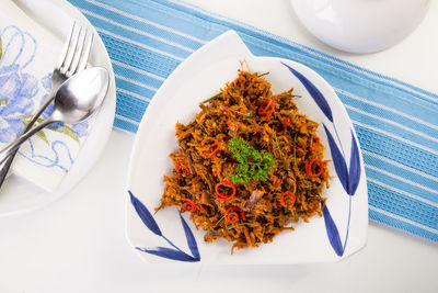 High angle view of food in plate on table