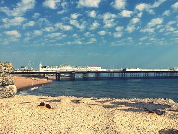 Pier over sea against sky