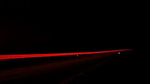 Light trails on road at night