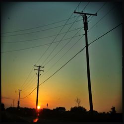 Electricity pylon at sunset