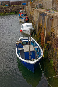 High angle view of fishing boat moored in lake