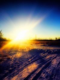 Scenic view of landscape at sunset