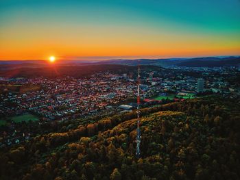 High angle view of cityscape against sky during sunset