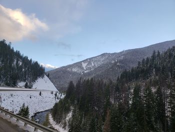 Scenic view of mountains against sky during winter