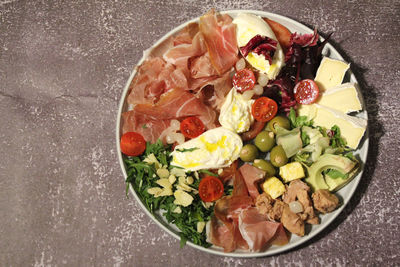 High angle view of chopped fruits in bowl