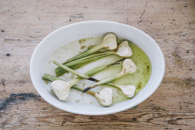 Healthy roasted fennel on plate at table