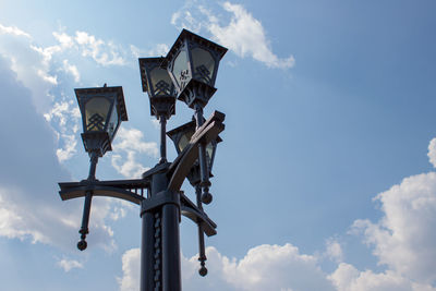 Low angle view of street light against sky